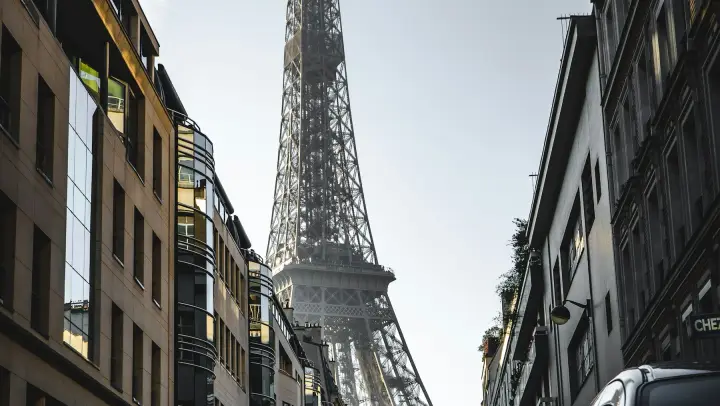 The Eiffel Tower seen down a Paris street